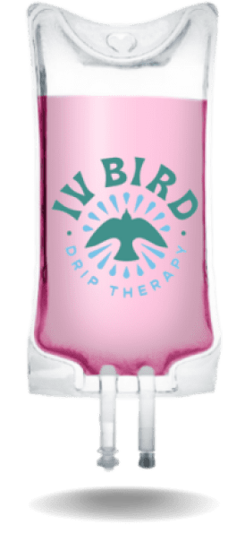 A pink bottle of liquid with the words iv bird drip therapy on it.