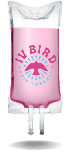 A pink bottle of liquid with the words " iv bird drip therapy ".